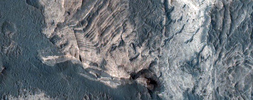 Light-Toned Stratified Materials in Melas Chasma
