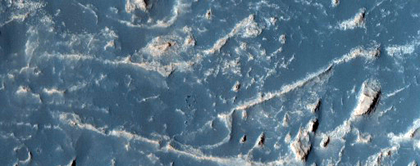 Fan at Terminus of Meandered Ridge in Reuyl Crater

