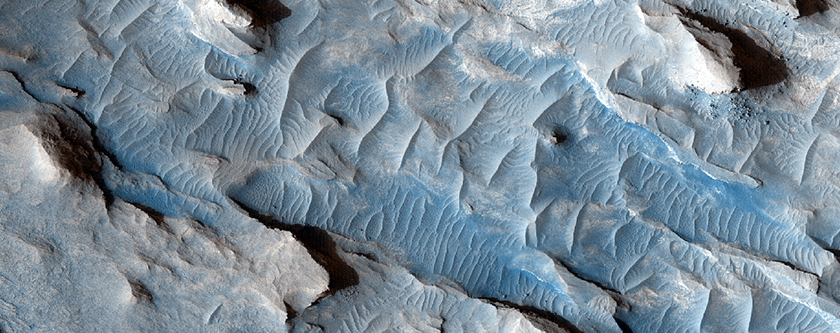 Transition from Flow to Light-Toned Material West of Meridiani Planum

