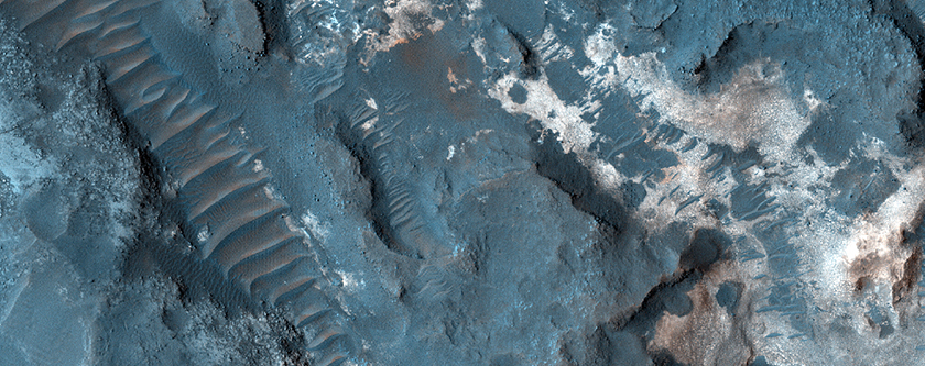 Layered Bedrock Exposure on Crater Floor