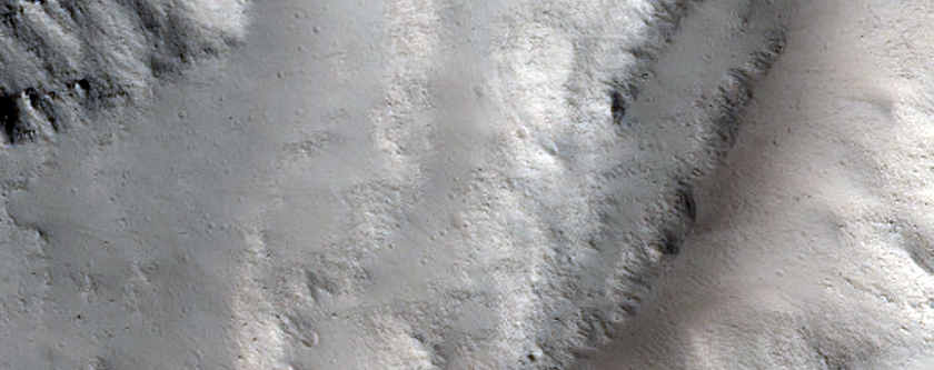 Ceraunius Fossae Graben with Collapse Pits