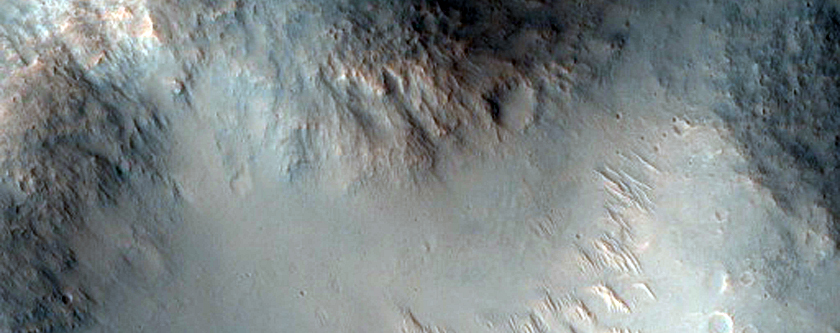 Possible Phyllosilicates on Rim of Crater in Margaritifer Terra