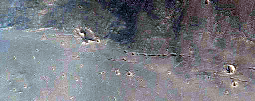 Crater Dissected by Subsidence and Eroded by Ius Chasma Rim