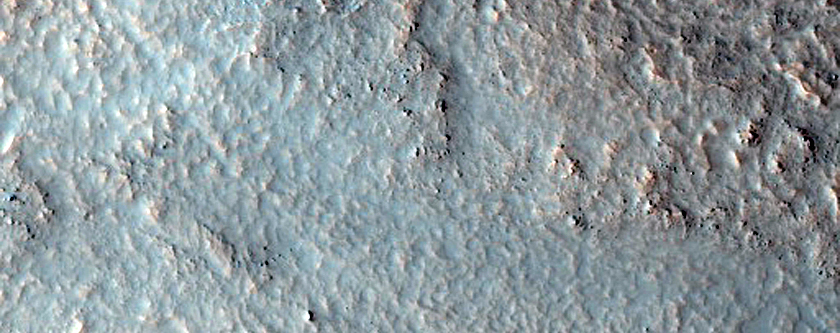 Possible Phyllosilicates in Crater Rim Near Mare Serpentis