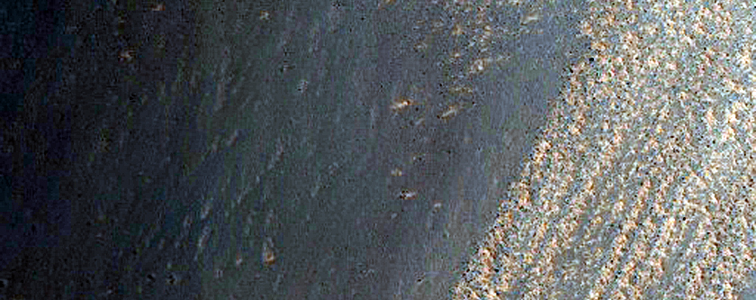 Landslide Scarp Cutting Crater in Noctis Labyrinthus