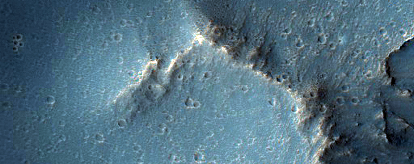 Possible Location of Past Hydrothermal Activity in Peta Crater