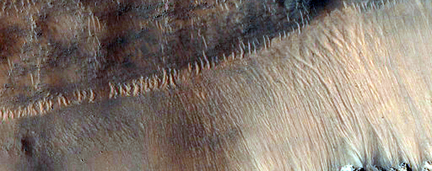 Monitor Slopes in Sirenum Fossae Graben