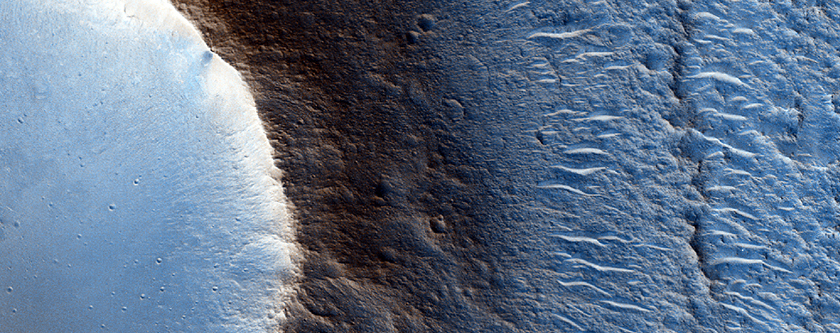 Layering at Peak of Cratered Cone in Chryse Planitia