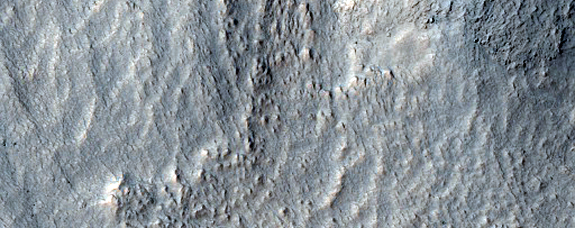 Features in  Crater in Promethei Terra