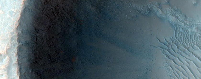 Possible Olivine and Mg-Fe Phyllosilicate-Rich Ejecta in Hesperia Planum