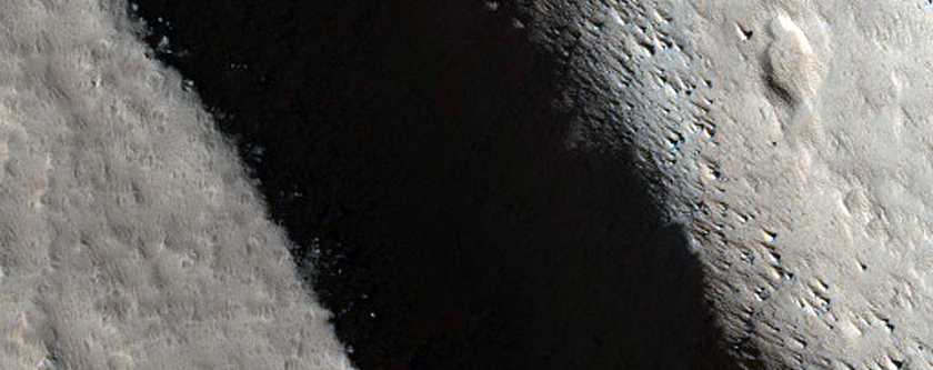 Collapse Pits on Olympus Mons Northern Flank