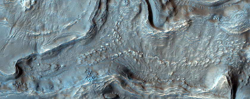 South Mid-Latitude Crater with Distinctive Floor Material