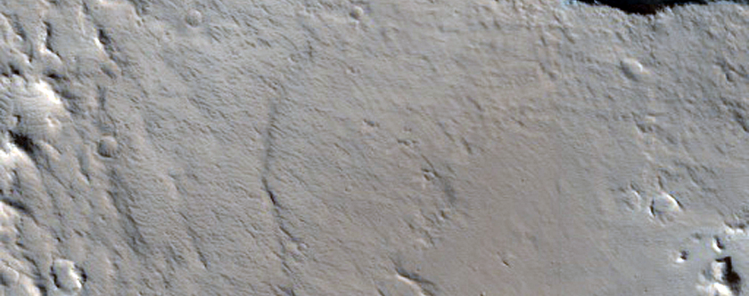 Kuilen naast de aureool van Olympus Mons