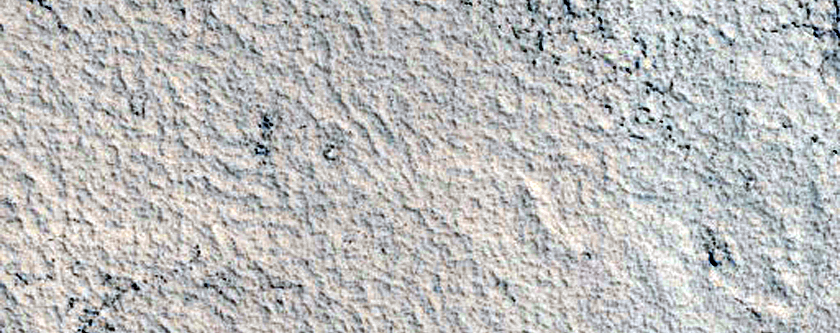 Kuilen in een lava-oppervlak in Amazonis Planitia