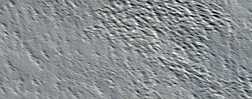 Small Channels in Ceraunius Fossae