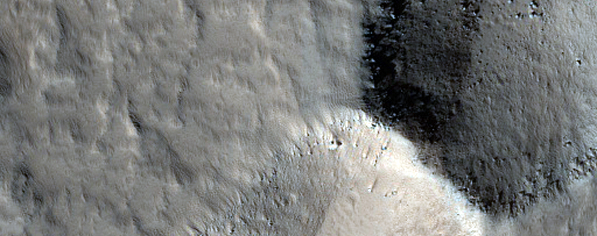 Collapse Pits on Northern Olympus Mons