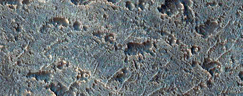 Light-Toned Stratified Materials in Melas Chasma