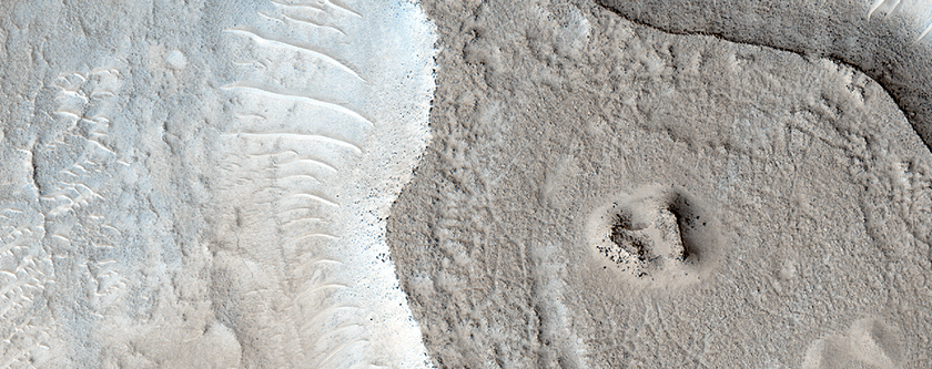 Thermally Variable Terrains North of Northern Antoniadi Crater