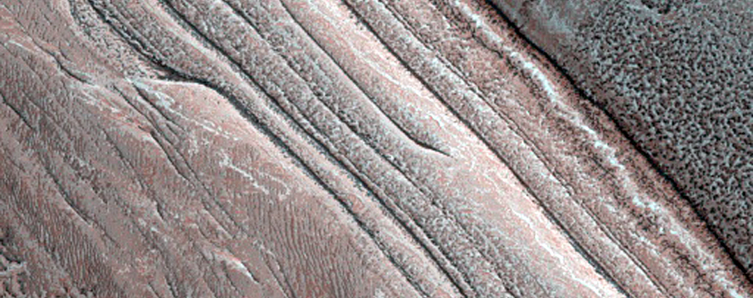 Steep North Polar Scarp and Potential Avalanches