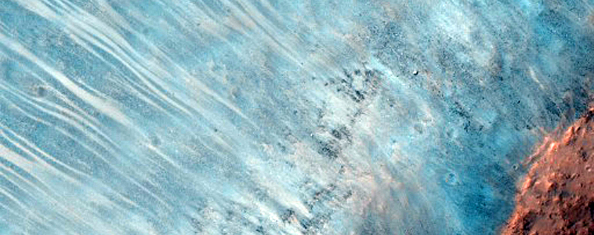 Impact Crater Exposing Bedrock
