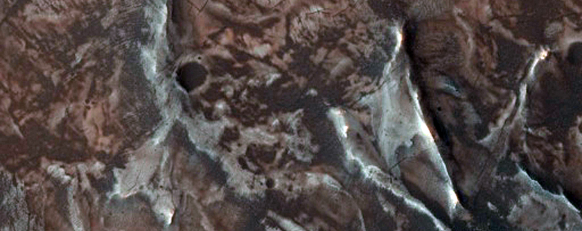 Alluvial Fan in Large Crater with Possible Phyllosilicate Ejecta