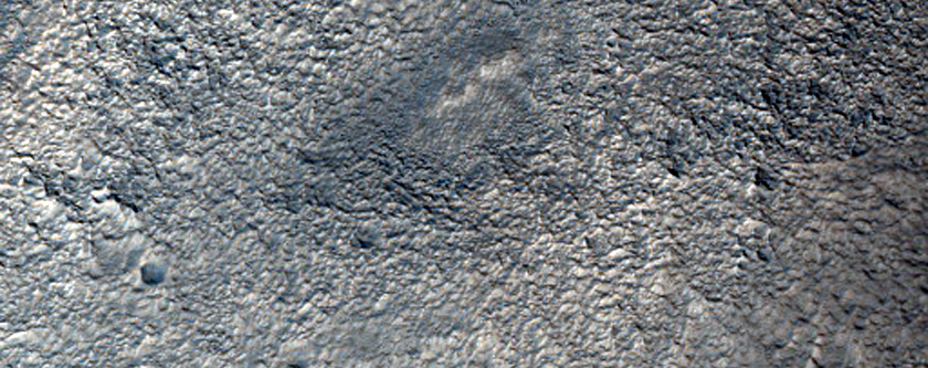 Tempe Terra Crater with Adjacent Mound and Graben