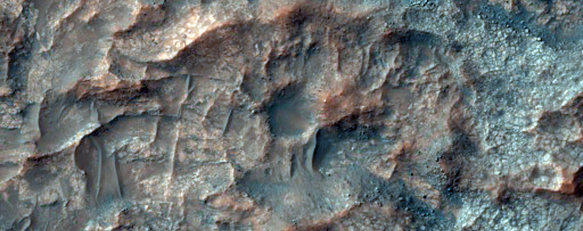 Possible Low-Calcium Pyroxene Outcrop in Wall of Crater Near Huygens Crater