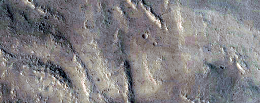 Crater and Graben in Tantalus Fossae