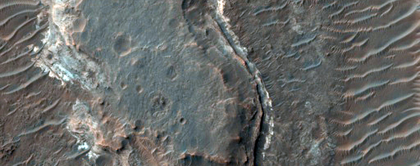 Exposures of Light-Toned Layered Material along Ladon Valles Floor
