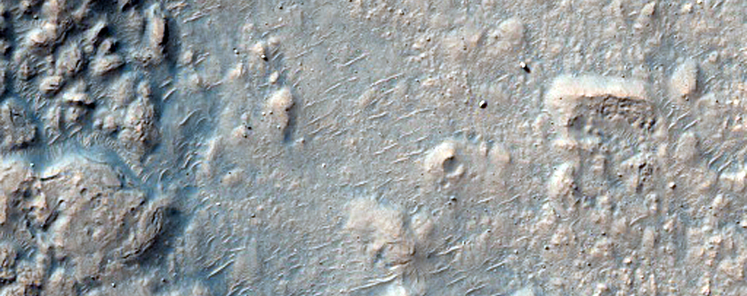 Layered Terrain in and Out of Crater in Northwest Hellas Planitia