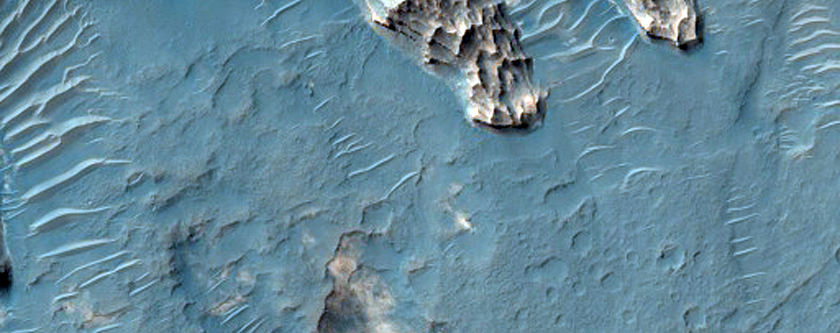 Layered Light-Toned Crater-Filling Material in Northwest Hellas Region