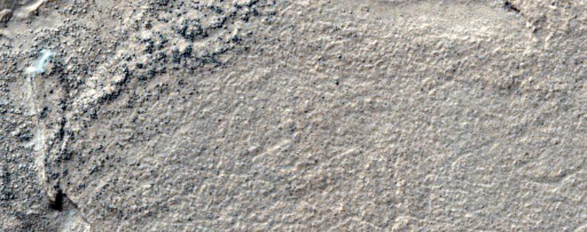 Interaction Ridges and Banded Terrain in Hellas Planitia