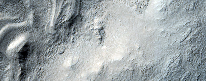 Inclined Layers on Crater Floor