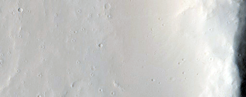 Pits along Graben in Ceraunius Fossae Region