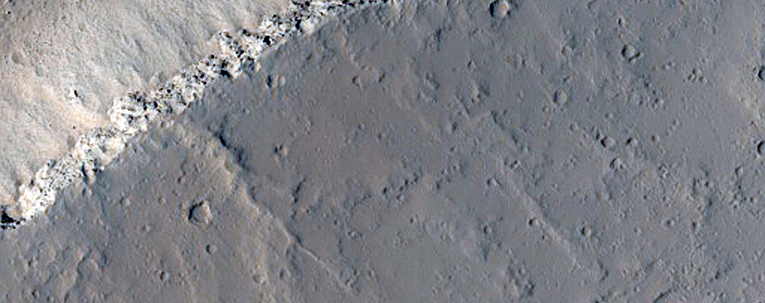 Small Shield in Tharsis Region Embayed by Younger Lavas