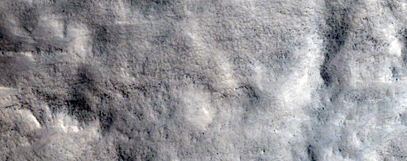 Rim and Ejecta of Very Fresh 7-Kilometer Diameter Impact Crater