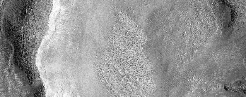 Two Craters along Floor and Wall of Mamers Valles