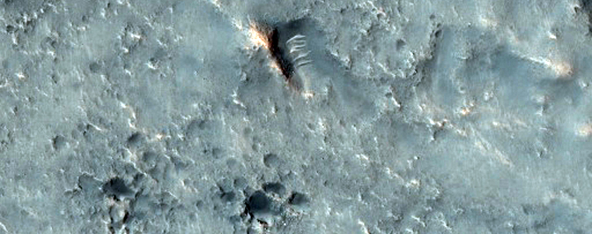 Cones Near Crater Ejecta West of Xanthe Dorsa