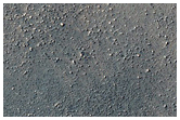 Possible Olivine and Pyroxene-Rich Flows in Terra Sirenum

