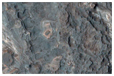 Light-Toned Deposits in Ladon Valles Basin
