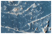 Fan at Terminus of Meandered Ridge in Reuyl Crater
