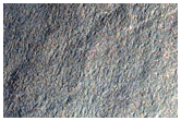 Tongue-Shaped Features on Crater Wall in THEMIS V26498011

