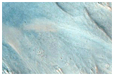 Monitoring Slopes in Ius Chasma