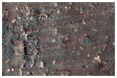 Valleys with Layered Sediments along Uplands at Ladon Valles Basin