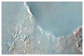 Mounds and Small Ridges along Wrinkle Ridge on Huygens Crater Floor