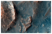 Central Peak with Tilted Layers