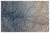 Central Structure of An Impact Crater in Promethei Terra