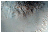 Possible Phyllosilicates on Rim of Crater in Margaritifer Terra