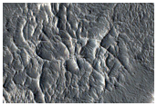 Sinuous Ridge and Surrounding Material Southwest of Capen Crater