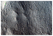 Channel in Mamers Valles Crater with Possible Phyllosilicates